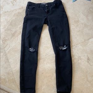 Free People black ripped knee jeans
